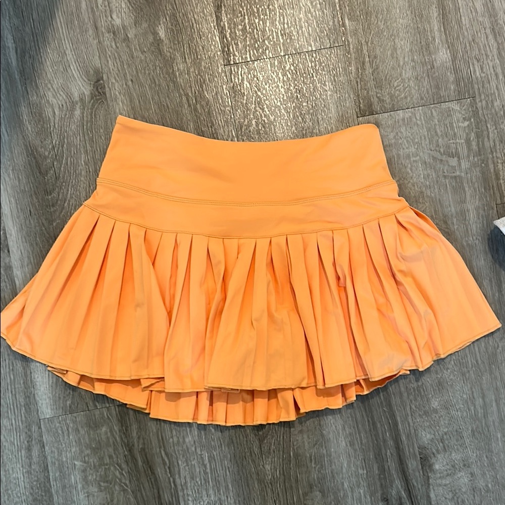 GOLDEN HINGE Pleated Orange Skirt